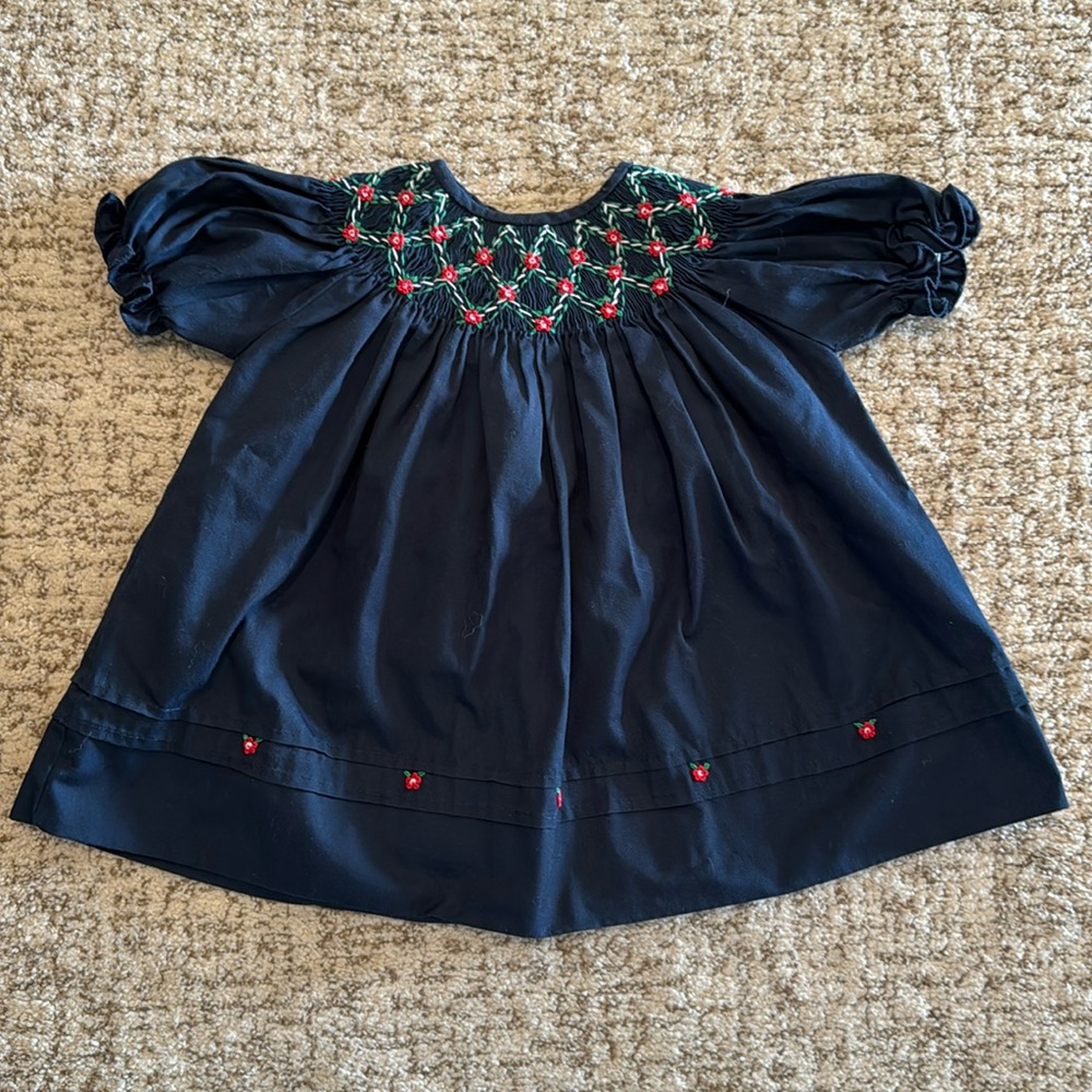 Navy smocked baby dress with red flowers